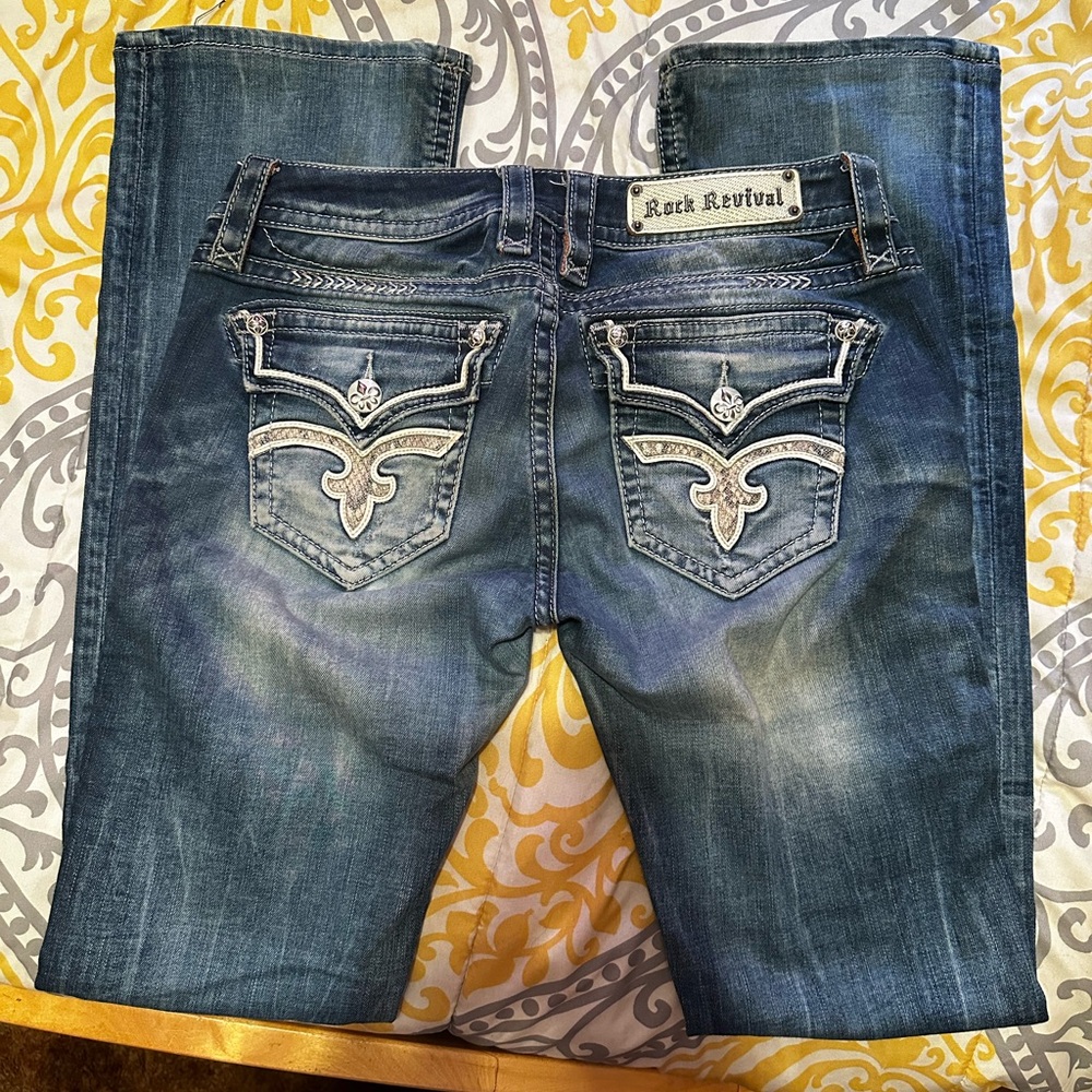 Rock Revival boot cut jeans with snake print